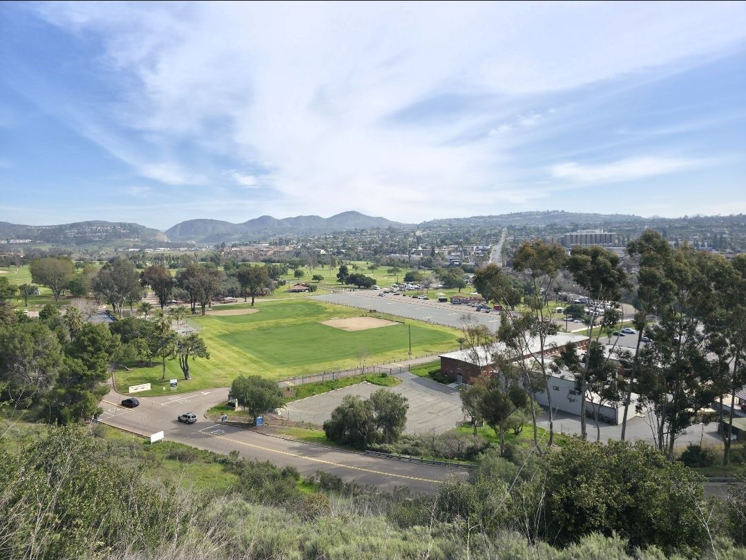 Admiral Baker Golf Course seen from the hill above the park, with the city beyond